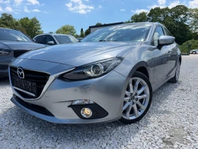 ������ Mazda 3