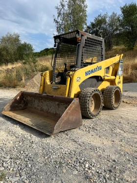 Мини челни товарачи Komatsu Sk815, снимка 1