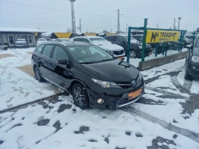 Toyota Auris 1.6-GPL-HIBRID, снимка 1