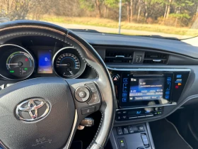 Toyota Auris 1.8 HYBRID , снимка 14