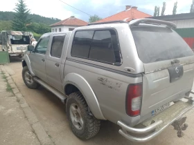 Nissan Navara - 8500 € / 16624.56 лв. - 58788229 8