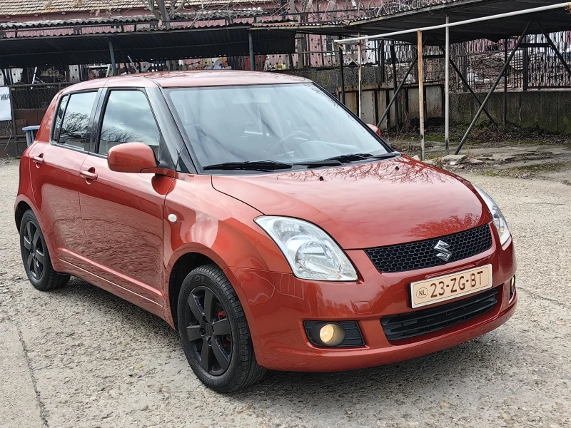 Suzuki Swift 1.3I, снимка 3 - Автомобили и джипове - 49006237