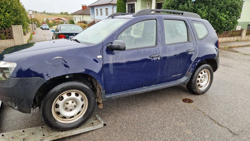 Dacia Duster 1.6 БЕНЗИН 4Х4 КЛИМА, снимка 3 - Автомобили и джипове - 47465823