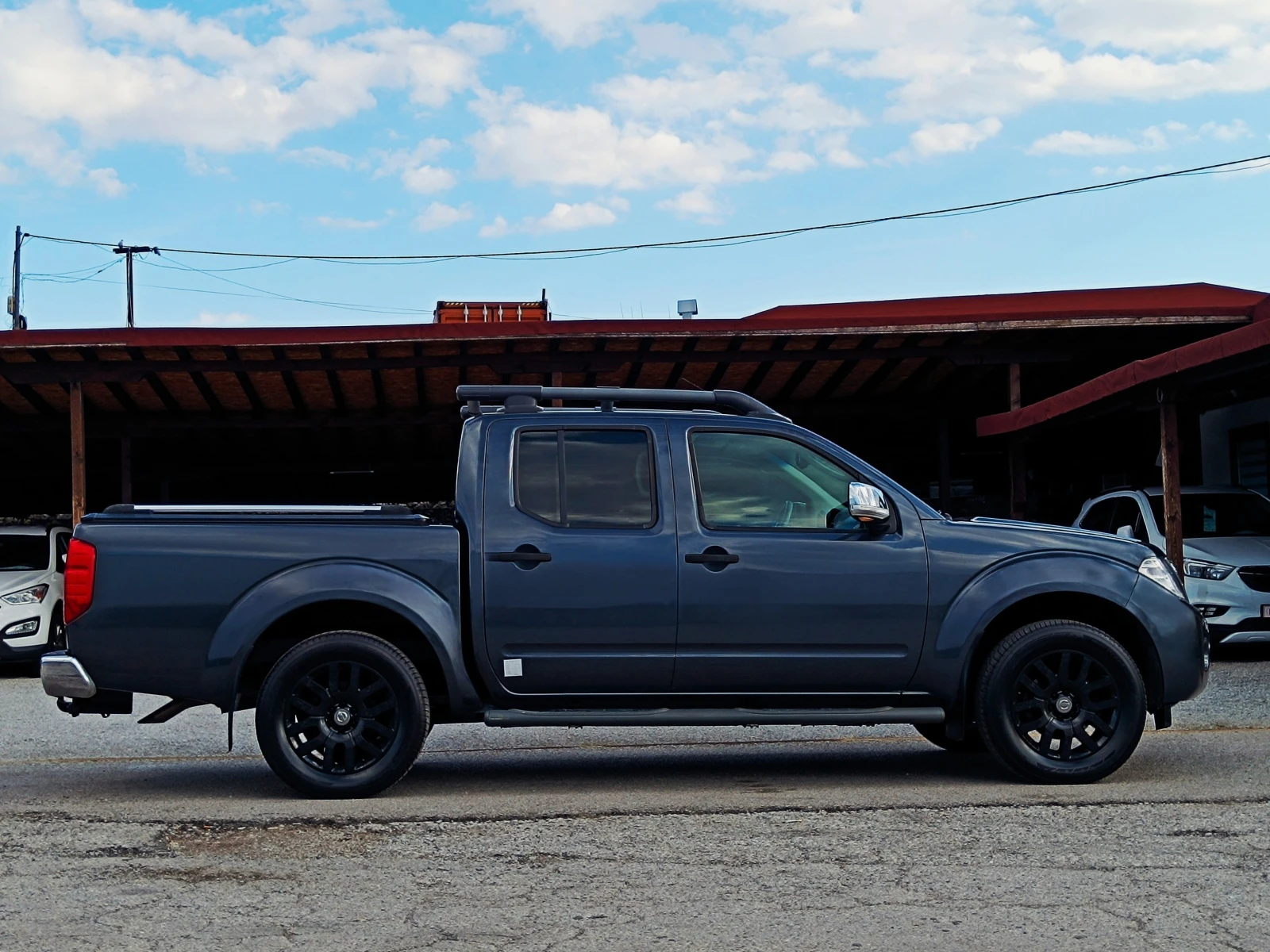 Nissan Navara 3.0 D* Luxury* 4x4* БАВНИ* Face Lift* АВТОМАТ* , снимка 4 - Автомобили и джипове - 54196341