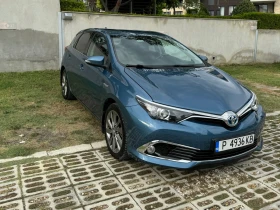 Toyota Auris HYBRID* LUNA* КЛИМАТРОНИК* ПЪРВИ СОБСТВЕНИК, снимка 1