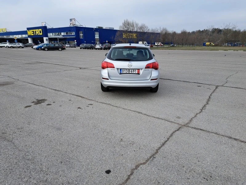 Opel Astra 1.3 CDTI, снимка 4 - Автомобили и джипове - 44631693