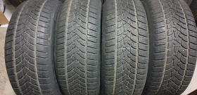 Гуми Зимни 235/55R19, снимка 2 - Гуми и джанти - 52869290