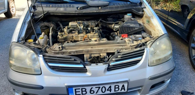 Nissan Almera tino, снимка 9 - Автомобили и джипове - 48231025