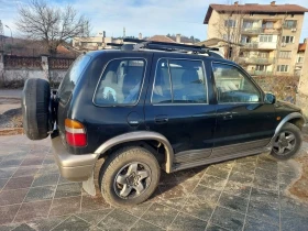 Kia Sportage - 2000 € / 3911.66 лв. - 56302368 5