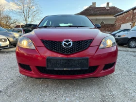 Mazda 3 1.4 i, снимка 8