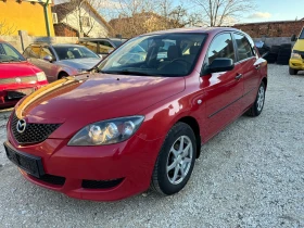 Mazda 3 1.4 i, снимка 1