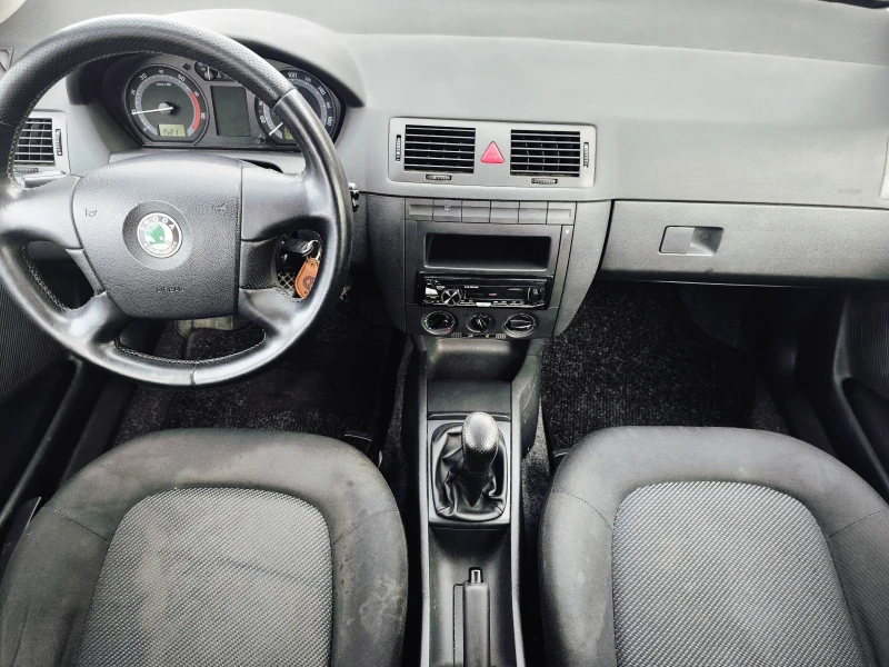 Skoda Fabia 1.2i 12V, снимка 11 - Автомобили и джипове - 52259288