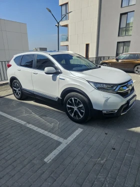 Обява за продажба на Honda Cr-v 2.0 Hybrid 4WD Executive  ~54 990 лв. - изображение 1 | Auto.bg Обява за продажба на Honda Cr-v 2.0 Hybrid 4WD Executive  ~54 990 лв. - изображение 1