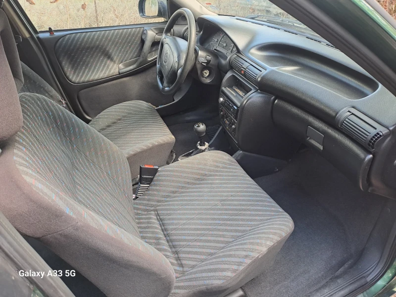 Opel Astra, снимка 6 - Автомобили и джипове - 47322814