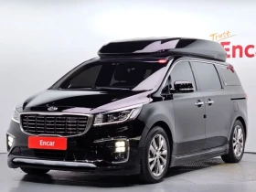 ������ Kia Carnival