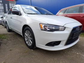 Обява за продажба на Mitsubishi Lancer 1.6i 16V 117к.с. ~13 299 лв. - изображение 1