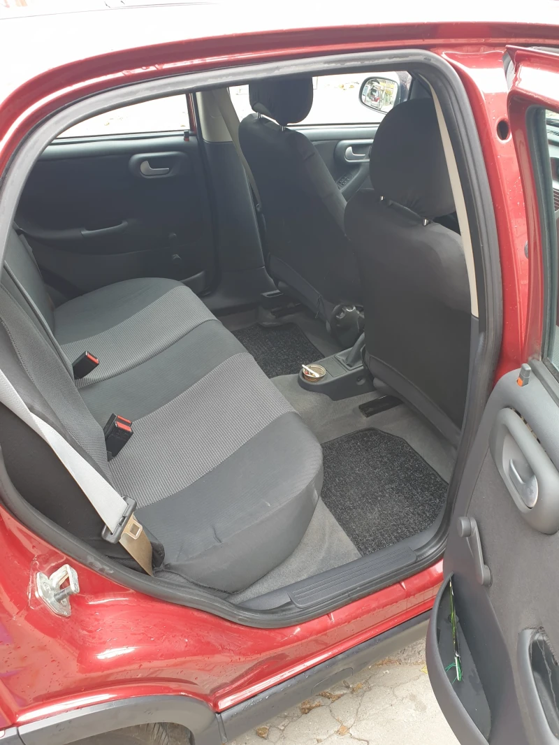 Opel Corsa, снимка 5 - Автомобили и джипове - 49608421