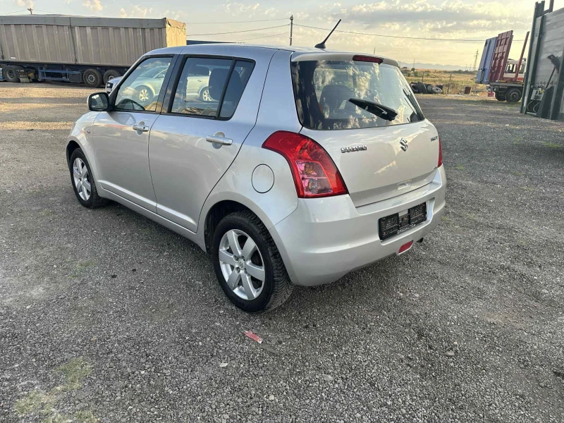 Suzuki Swift 1.3 i, снимка 4 - Автомобили и джипове - 51426660
