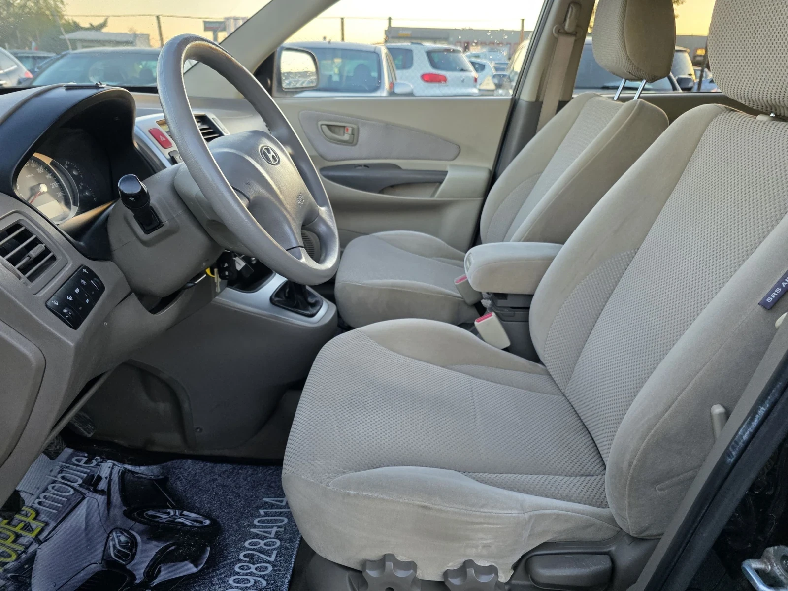 Hyundai Tucson 2.0 газ 196000, снимка 9 - Автомобили и джипове - 54323116