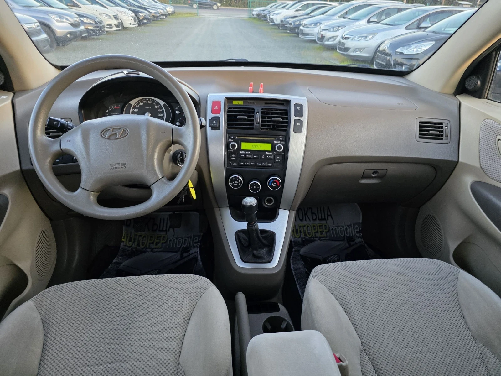 Hyundai Tucson 2.0 газ 196000, снимка 13 - Автомобили и джипове - 54323116