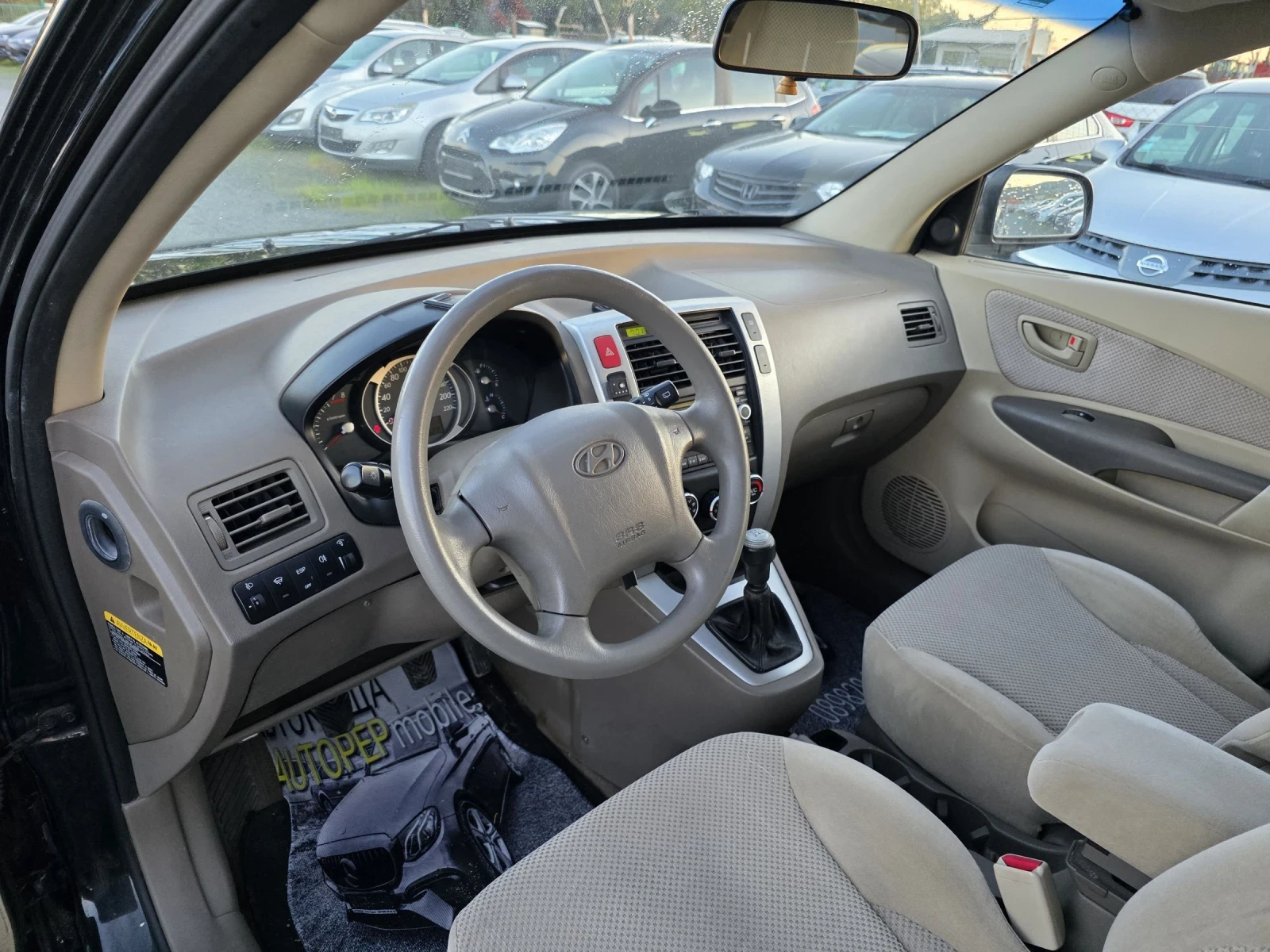 Hyundai Tucson 2.0 газ 196000, снимка 11 - Автомобили и джипове - 54323116