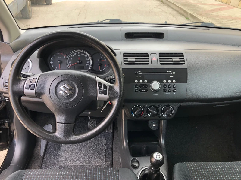 Suzuki Swift 1.3DOHC 92k.c., снимка 10 - Автомобили и джипове - 45751252