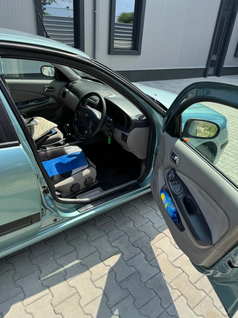 Nissan Almera, снимка 9 - Автомобили и джипове - 52477133