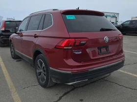 VW Tiguan Highline /CARFAX/ НАВИ/ПОДГРЕВ/КОЖА/4Х4/ПАНОРАМА, снимка 3 - Автомобили и джипове - 53700294