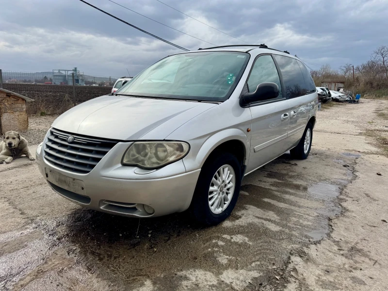 Chrysler Voyager 2.8crd automat кожен салон, снимка 1 - Автомобили и джипове - 49461763