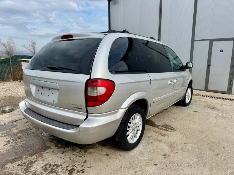 Chrysler Voyager 2.8crd automat кожен салон, снимка 6 - Автомобили и джипове - 49461763