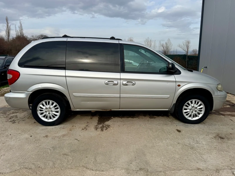 Chrysler Voyager 2.8crd automat кожен салон, снимка 8 - Автомобили и джипове - 49461763