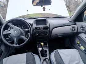 Nissan Almera, снимка 4 - Автомобили и джипове - 53655347