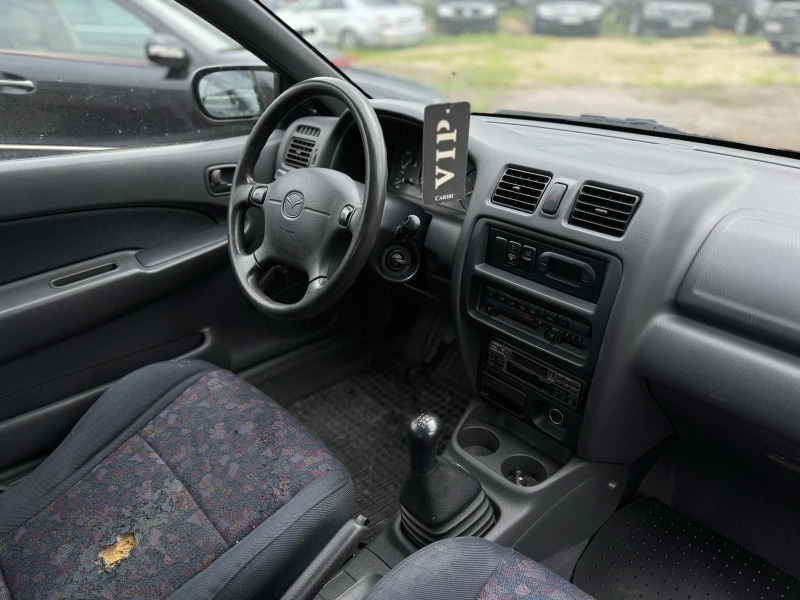 Mazda 323 1.3, снимка 9 - Автомобили и джипове - 45717540