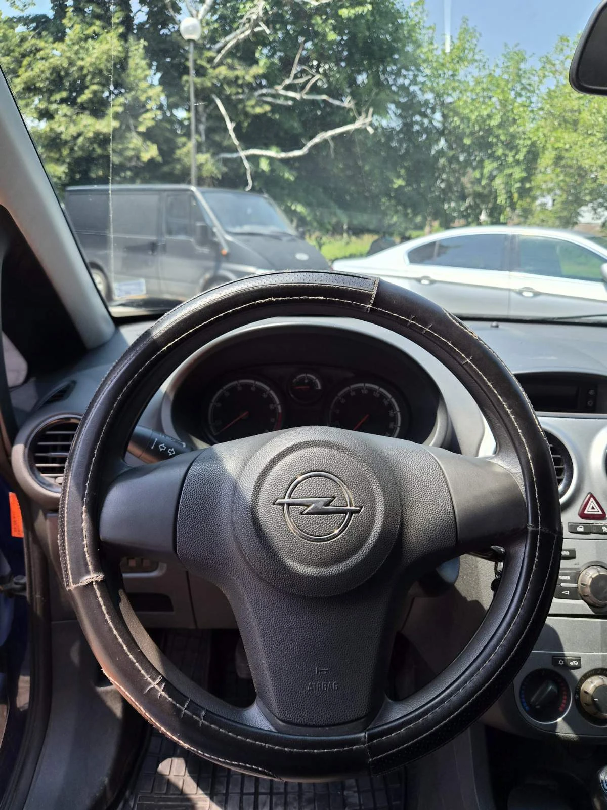 Opel Corsa 1.2i ЕCOTEC, снимка 9 - Автомобили и джипове - 55305710
