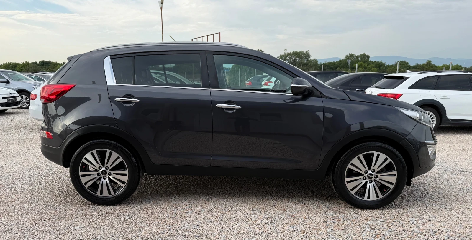 Kia Sportage 1.7cdti* Facelift* Кожа * Нави* Сервизна история, снимка 6 - Автомобили и джипове - 55372401