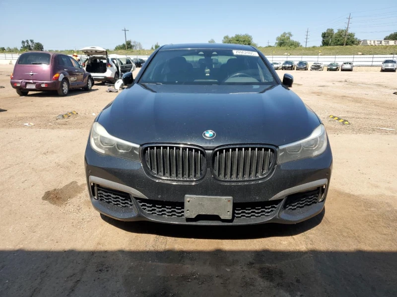 BMW 740 i 3.0 Turbo / M пакет / 20  джанти / Спортно окач., снимка 5 - Автомобили и джипове - 52095778