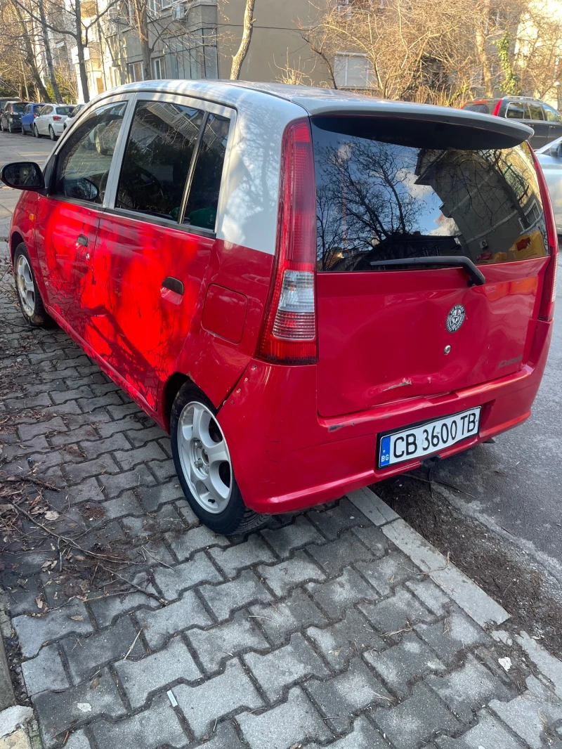 Daihatsu Cuore, снимка 4 - Автомобили и джипове - 53573781