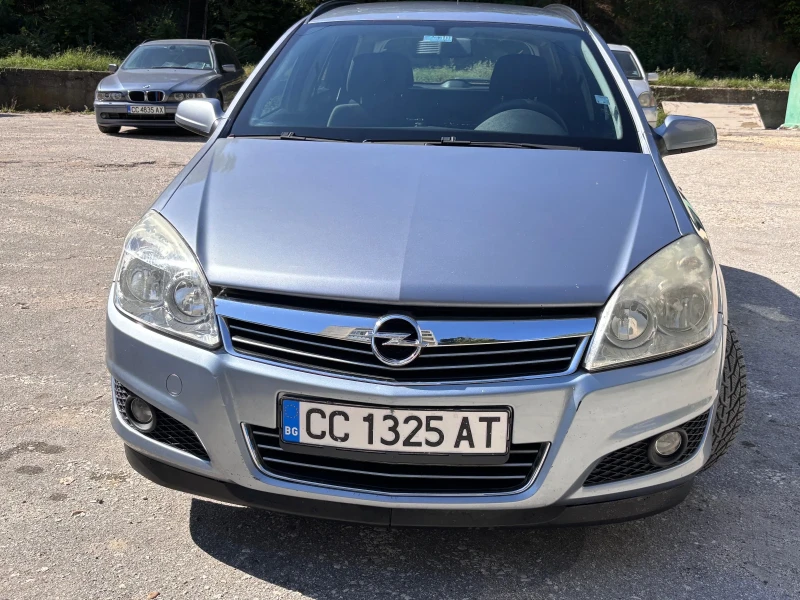 Opel Astra Комби, снимка 4 - Автомобили и джипове - 47329475