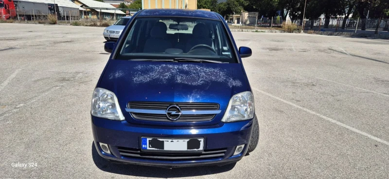Opel Meriva 1.7CDTI, снимка 9 - Автомобили и джипове - 51542435