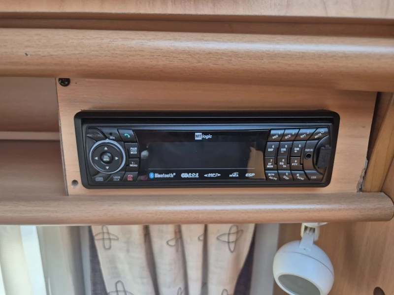 Каравана Burstner 395 EKT МУВЪР , снимка 9 - Каравани и кемпери - 51441433