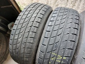 Гуми Зимни 235/65R17, снимка 2 - Гуми и джанти - 38527852