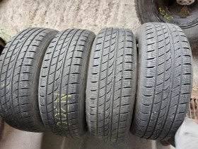 Гуми Зимни 235/65R17, снимка 1 - Гуми и джанти - 38527852