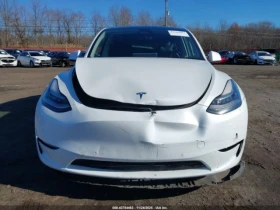 Tesla Model Y DUAL MOTOR ALL-WHEEL DRIVE - 15400 € / 30119.78 лв. - 87465588 12