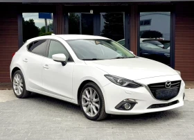 ������ Mazda 3
