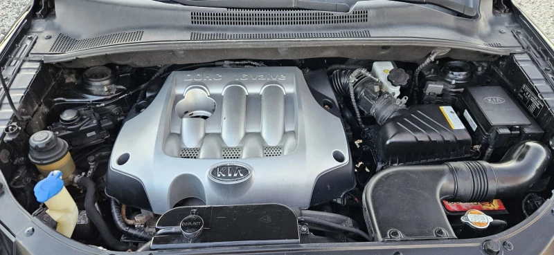 Kia Sportage 2.0i* 4X4* Полукожа* Подгрев , снимка 16 - Автомобили и джипове - 52938768