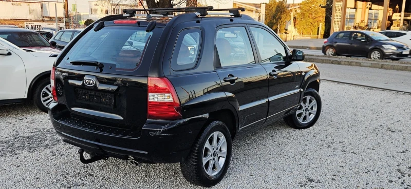 Kia Sportage 2.0i* 4X4* Полукожа* Подгрев , снимка 13 - Автомобили и джипове - 52938768