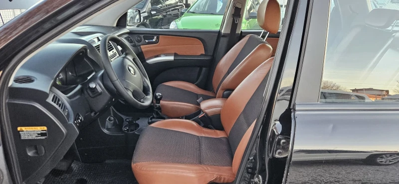 Kia Sportage 2.0i* 4X4* Полукожа* Подгрев , снимка 4 - Автомобили и джипове - 52938768
