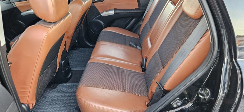 Kia Sportage 2.0i* 4X4* Полукожа* Подгрев , снимка 6 - Автомобили и джипове - 52938768