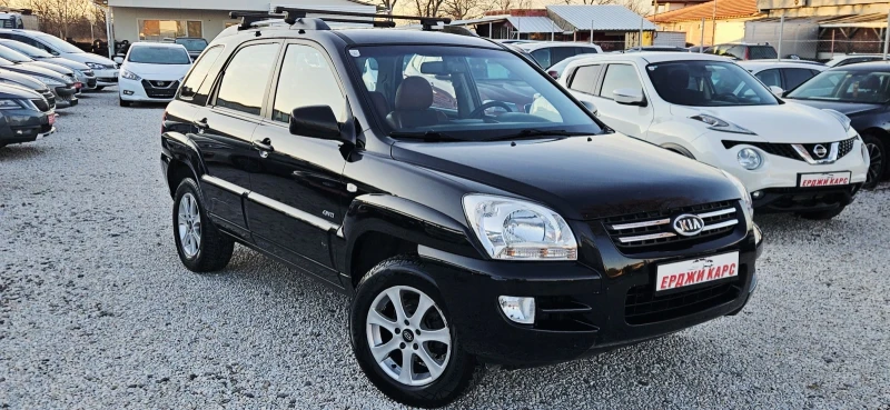 Kia Sportage 2.0i* 4X4* Полукожа* Подгрев , снимка 9 - Автомобили и джипове - 52938768