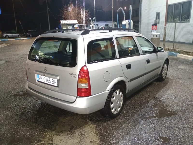 Opel Astra Комби, снимка 6 - Автомобили и джипове - 48196619